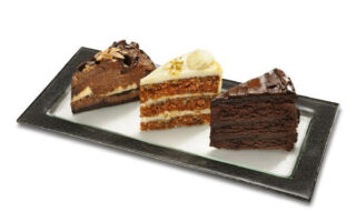 Three different types of cakes on a plate.